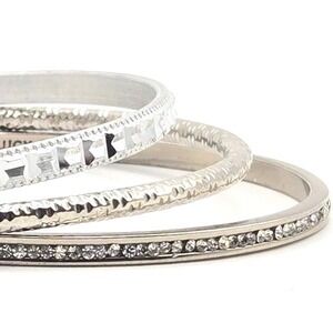 One Juicy Couture Rhinestone and Two Other Silver Tone Stackable Bangle Bracelet